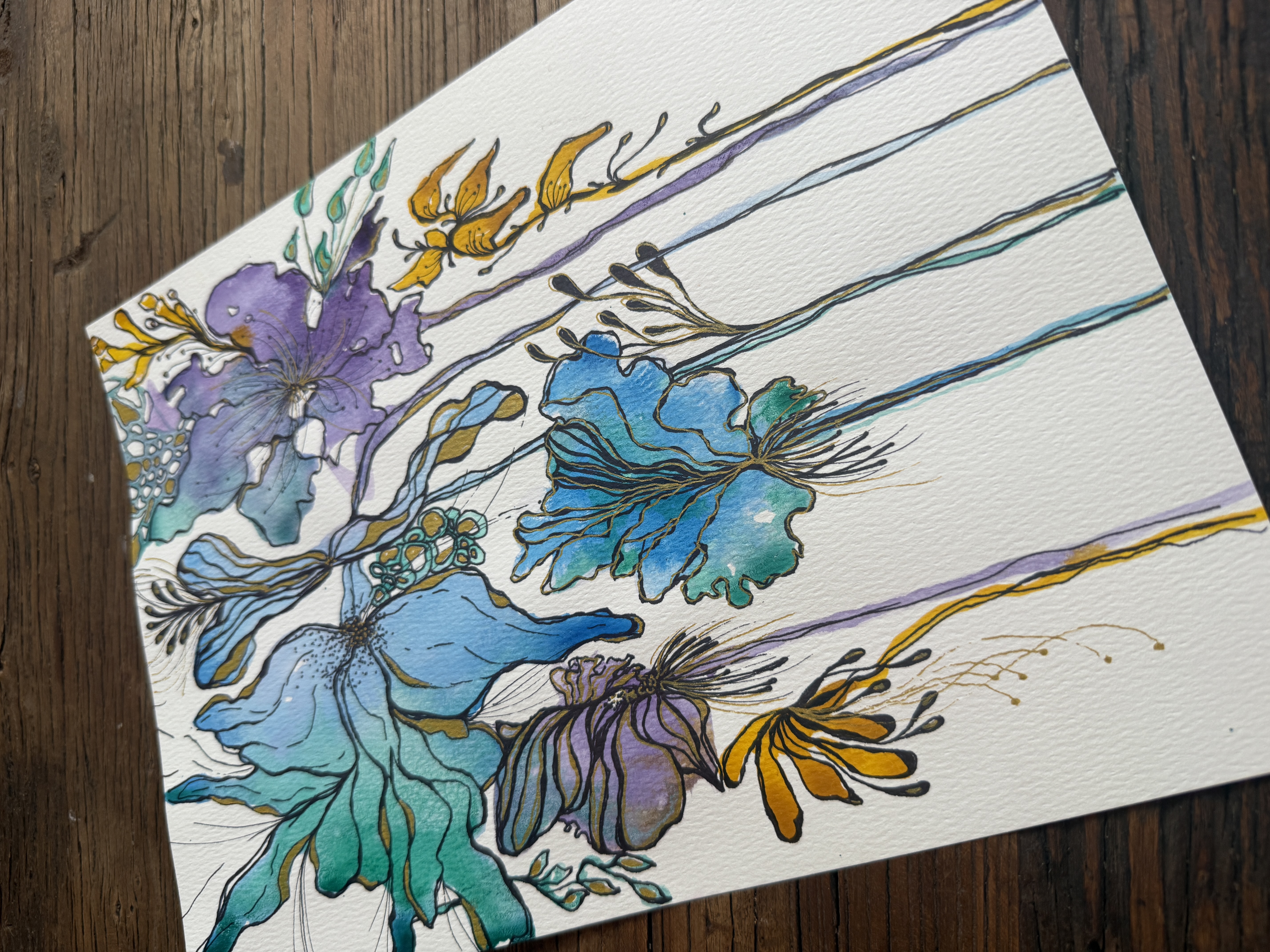 Watercolor flowers with long stems in teal and gold