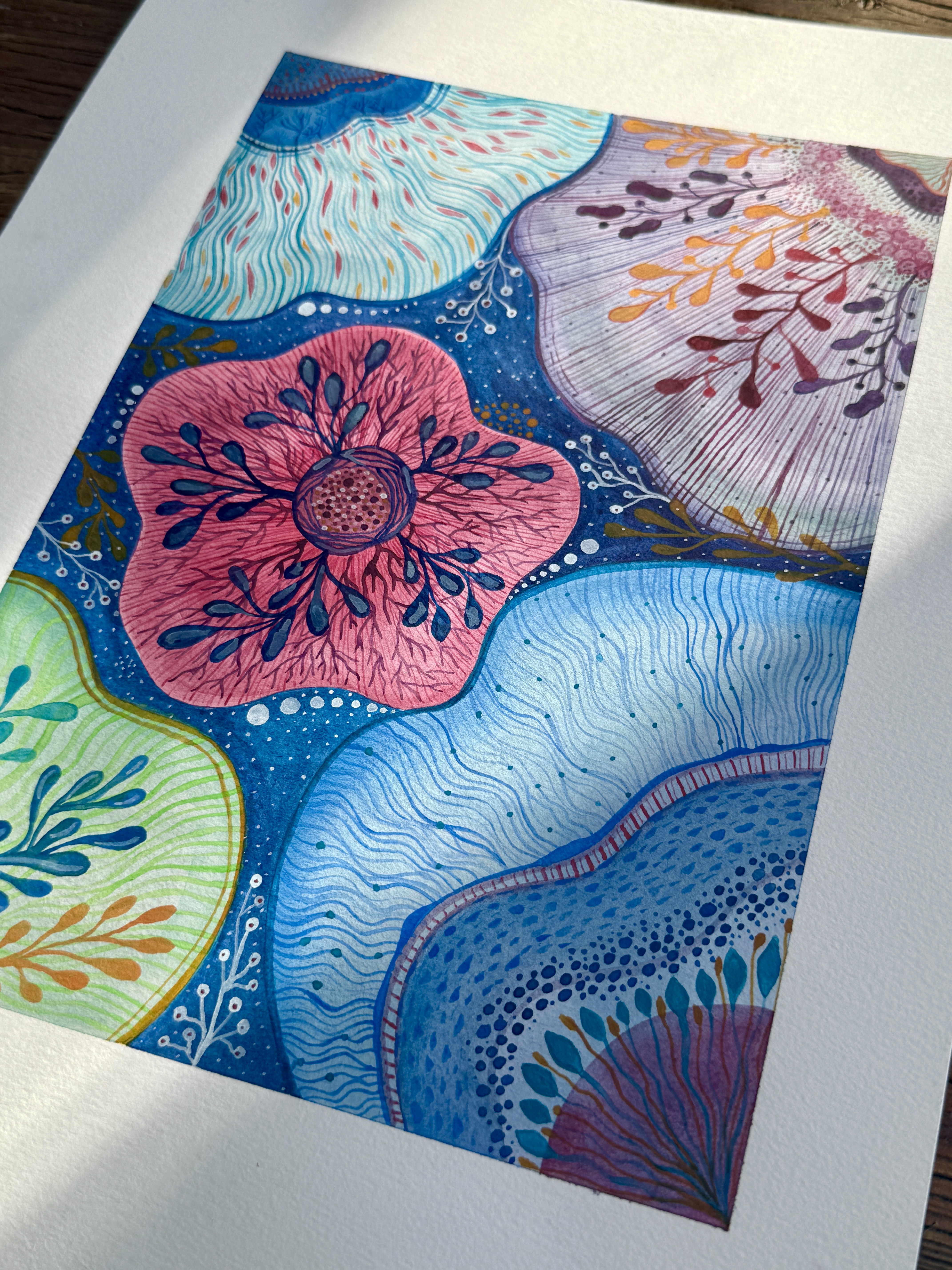 Tidepool watercolor with cellular forms and fine linework