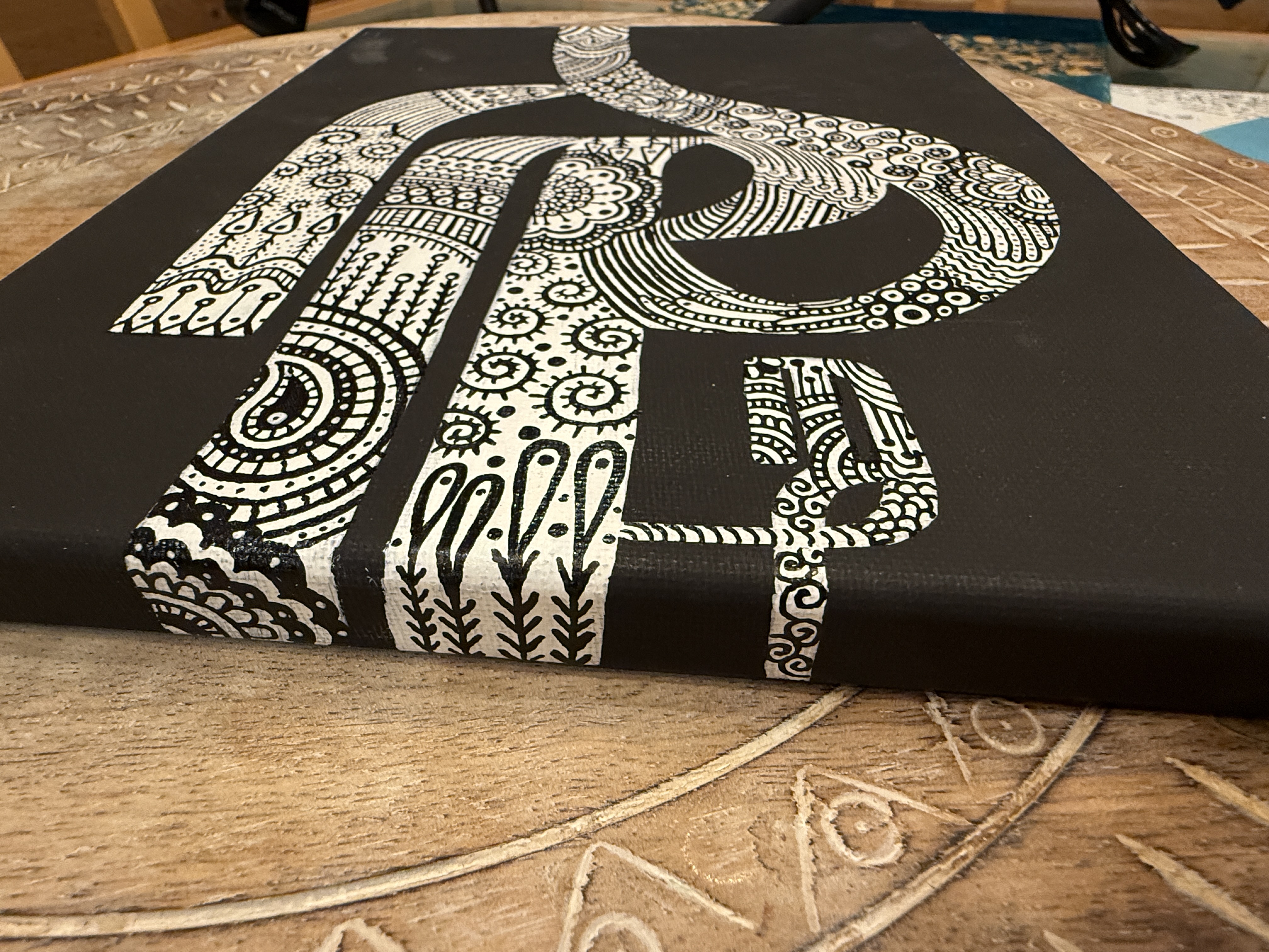 Finished patterned calligraphy canvas in black and white