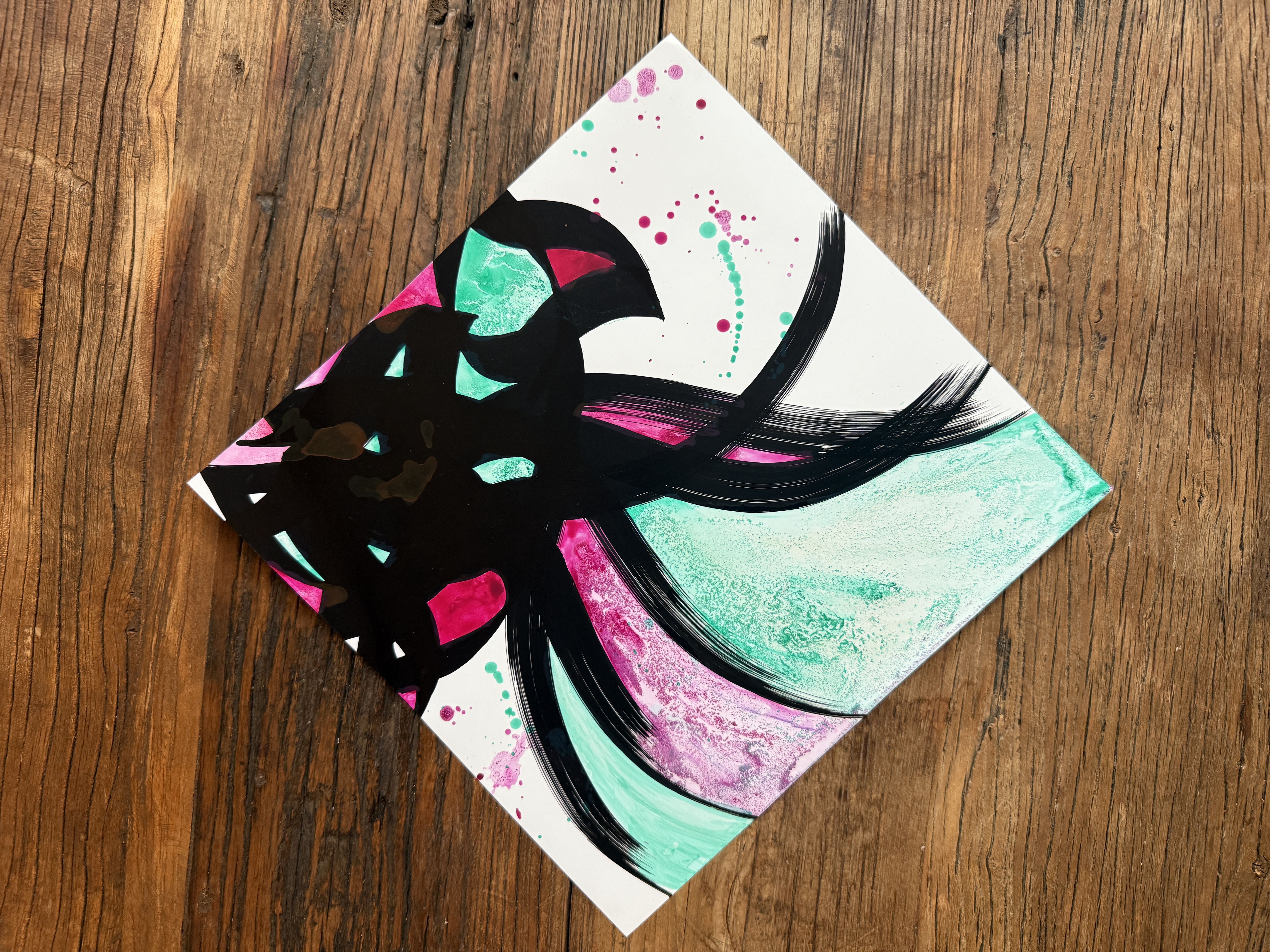 Freestyle calligraphy over green and pink washes