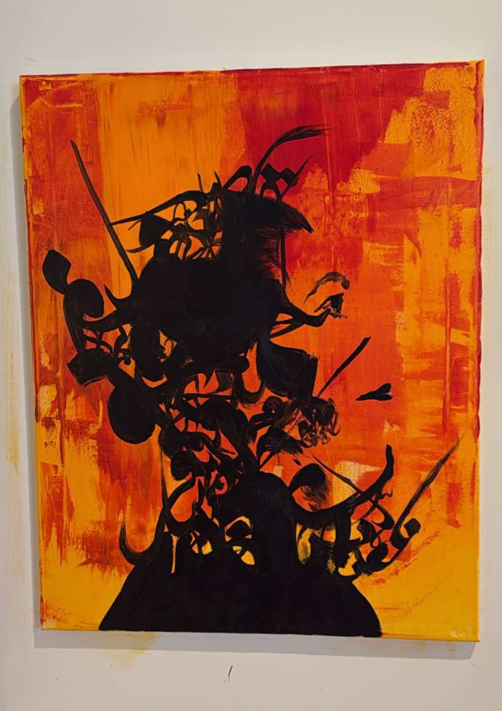 Black calligraphy on orange and red painted canvas