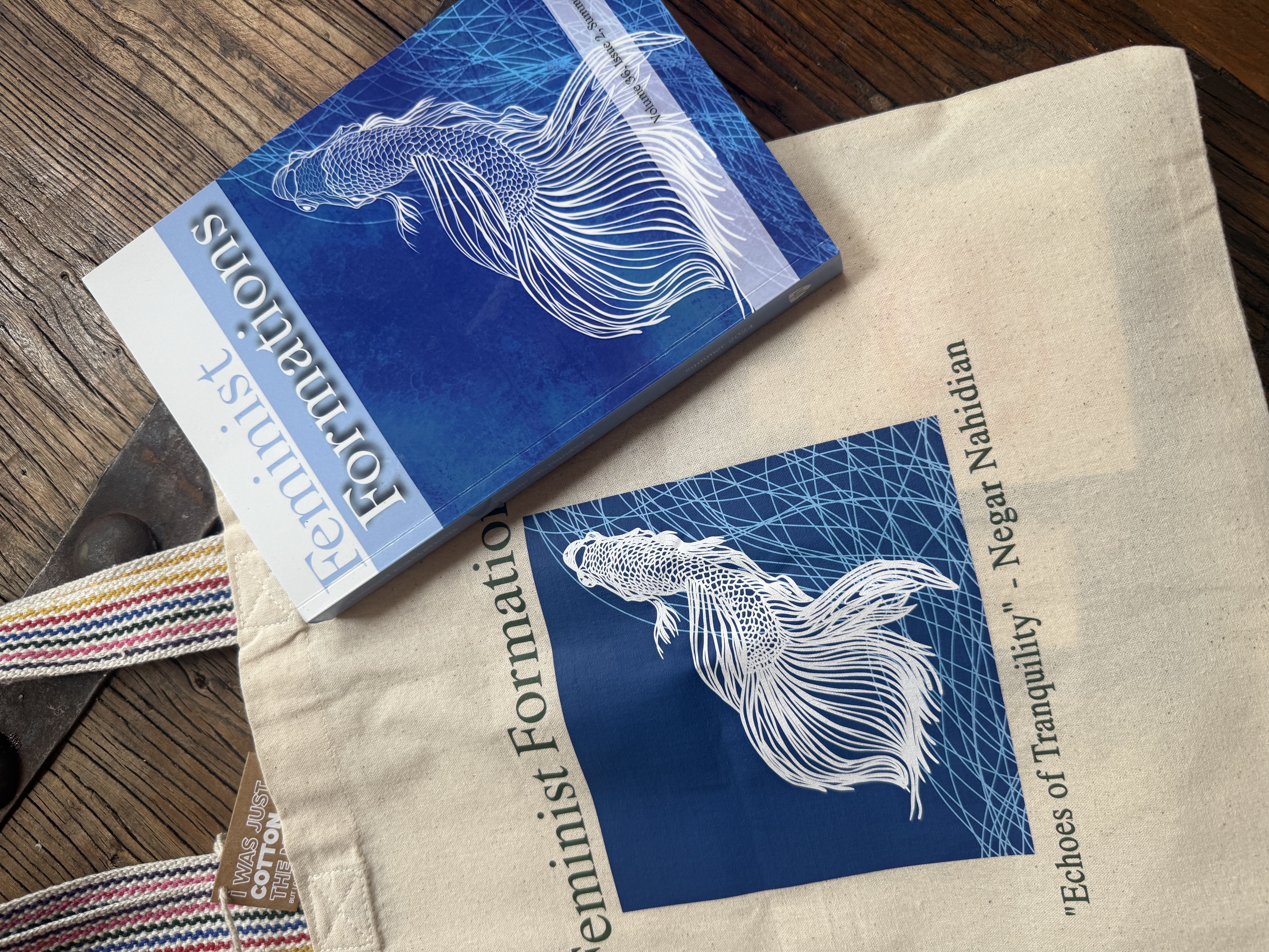 Feminist Formations journal cover and tote bag with koi artwork