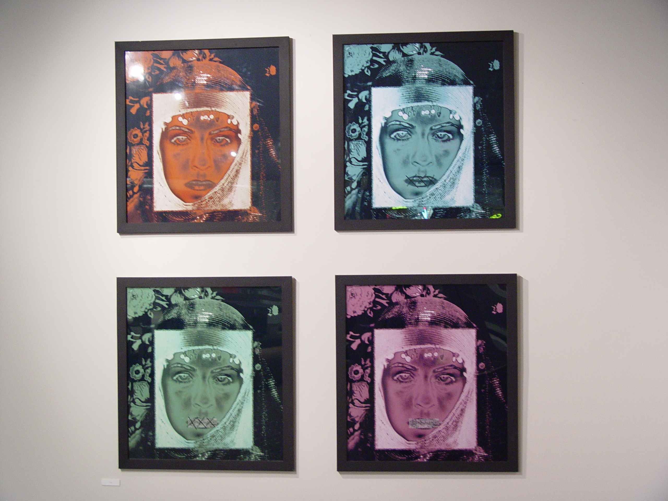 Four veiled portraits in orange, teal, green and pink